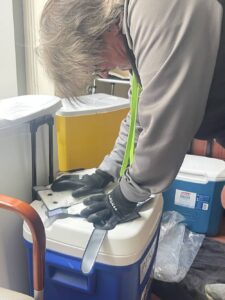 Checking the temperature of a Penguin Cold Cap before use